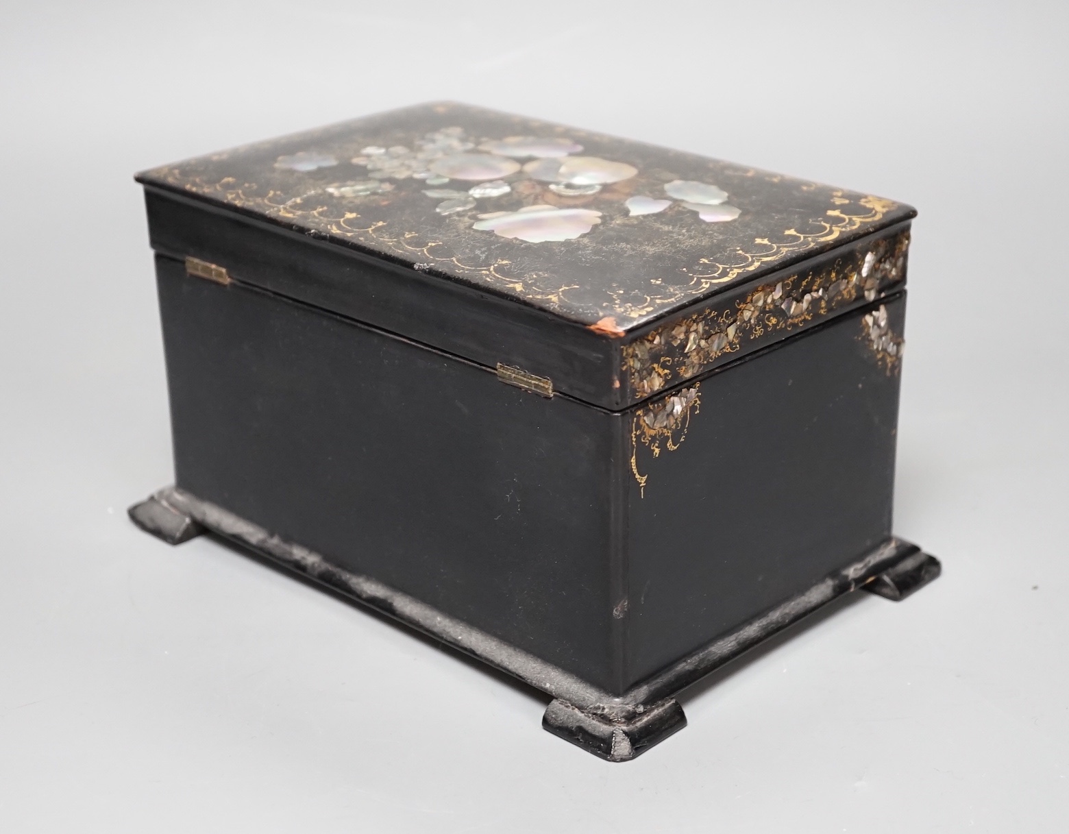 A Victorian inlaid papier mache tea caddy, 21cm wide